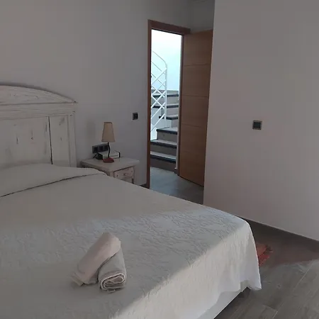 Adosado En La