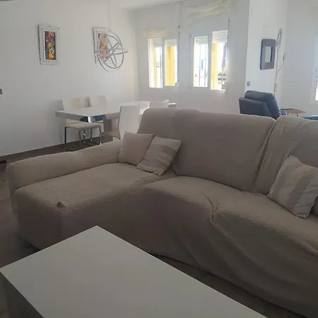 Adosado En La