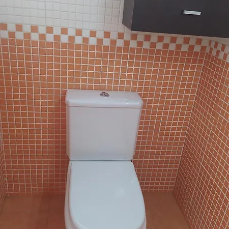 Adosado En La